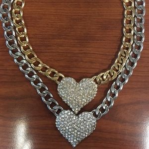 1 Gold & 1 Silver Heart Necklace (both included)